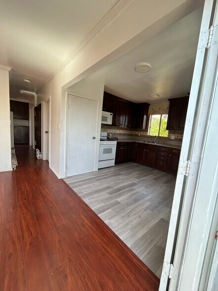 Living room to kitchen - 1156 N Chicago St