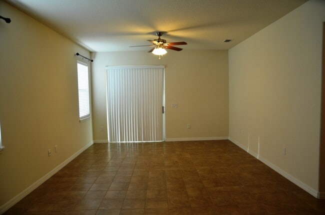 Building Photo - Nice 3/2 with Tile Flooring and 2-Car Garage in Azalea Cove (SE Orlando)