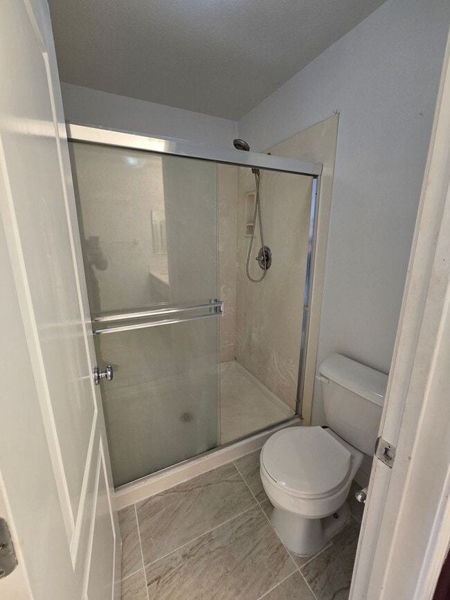 Building Photo - Beautifully Remodeled Tri Story Home located in a Gated Community ...