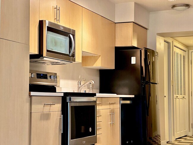 Building Photo - Downtown Bellevue Studio with Balcony, In-...