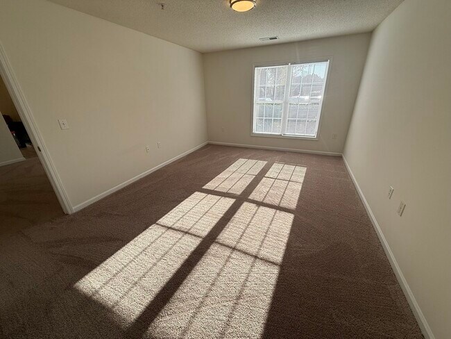 Building Photo - Adorable 1 Bed 1.5 Bath Condo in Brier Creek! 1st Floor! Sun Room! New Appliances!