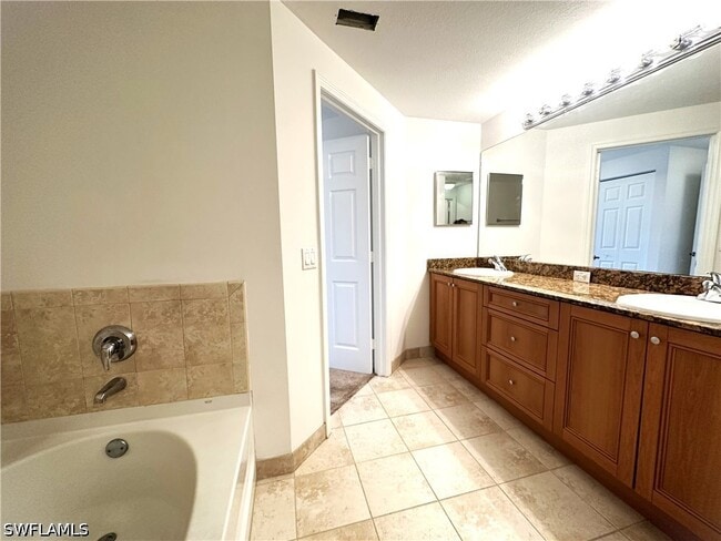 Building Photo - 10101 Villagio Palms Way
