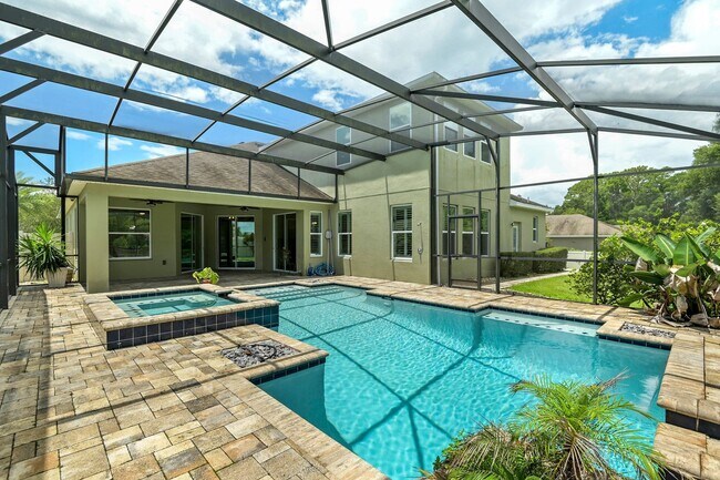 Building Photo - Expansive 4 bedroom, 3 bath remodeled home in gated community