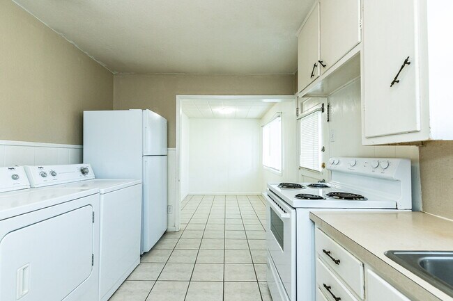 Building Photo - 2-Bedroom Home - Cozy 705 sq ft Oasis with...