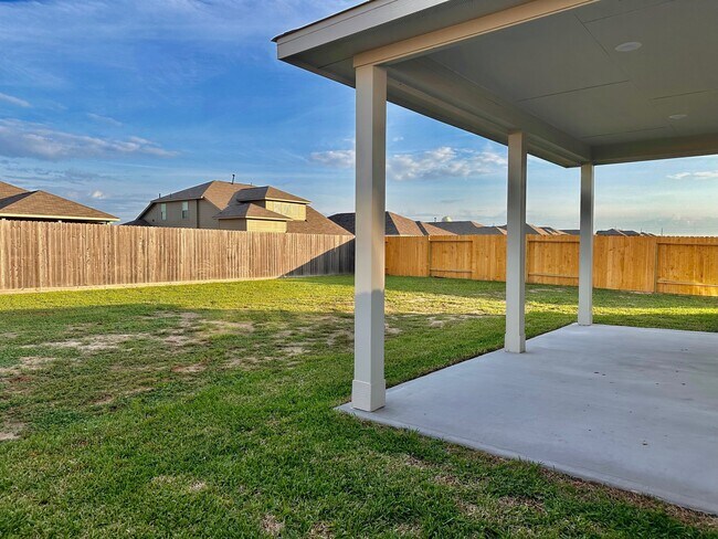 The oversized patio and backyard are waiting for you to make memories! - 507 Turtle Dove Dr