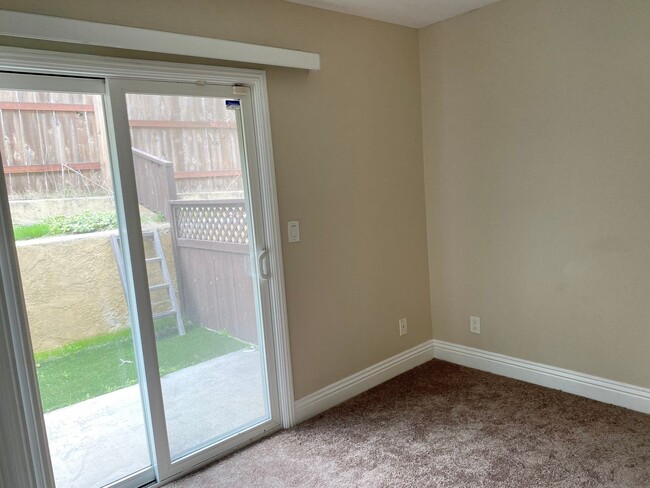 Building Photo - AFFORDABLE 1st Floor Condo & patio yard!