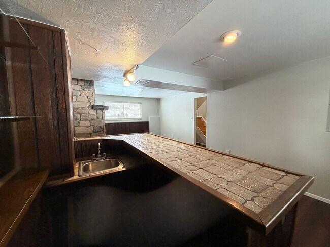 Building Photo - 4-Bed Home Near Clement Park with Entertainer’s Basement & Outdoor Oasis