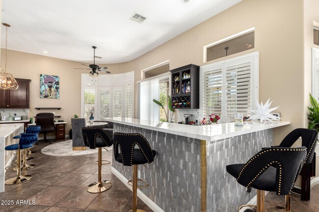 Building Photo - 4935 W Yearling Rd