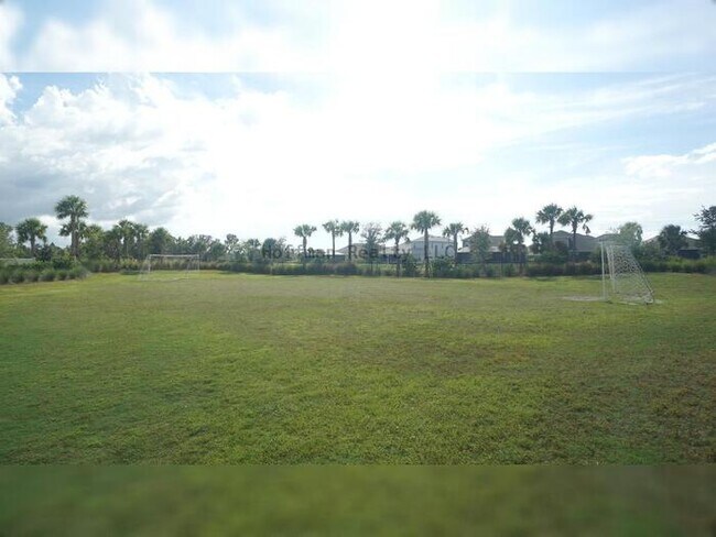 Building Photo - Stunning 5-Bedroom Lakeview Home in River Landing, Wesley Chapel