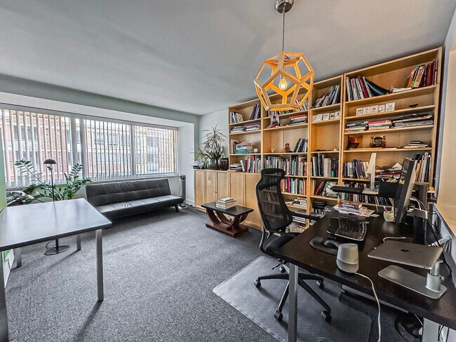 Building Photo - Bright and Sophisticated Studio Minutes Away from The Warf With Storage, Parking & Utilities Incl...