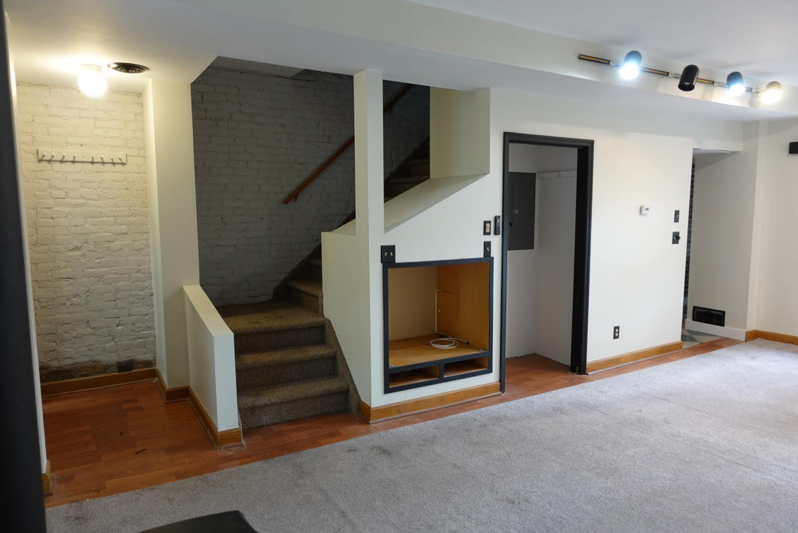 Exposed brick stairway adds to the charm of this historic home - 327 Hudson Ave