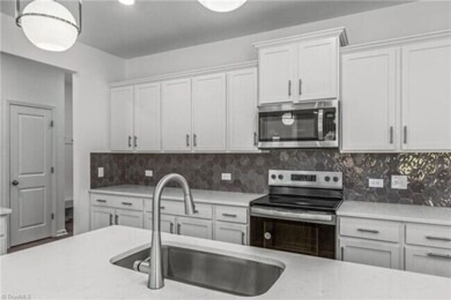 Building Photo - Spacious 3-Bedroom Townhome with Private Patio, Central HVAC & In-Unit Laundry Hookups