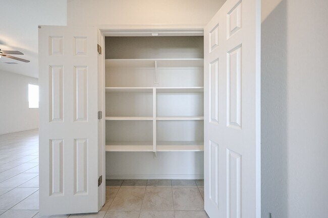 Building Photo - New 4 Bedroom + Den Home in Asante Community