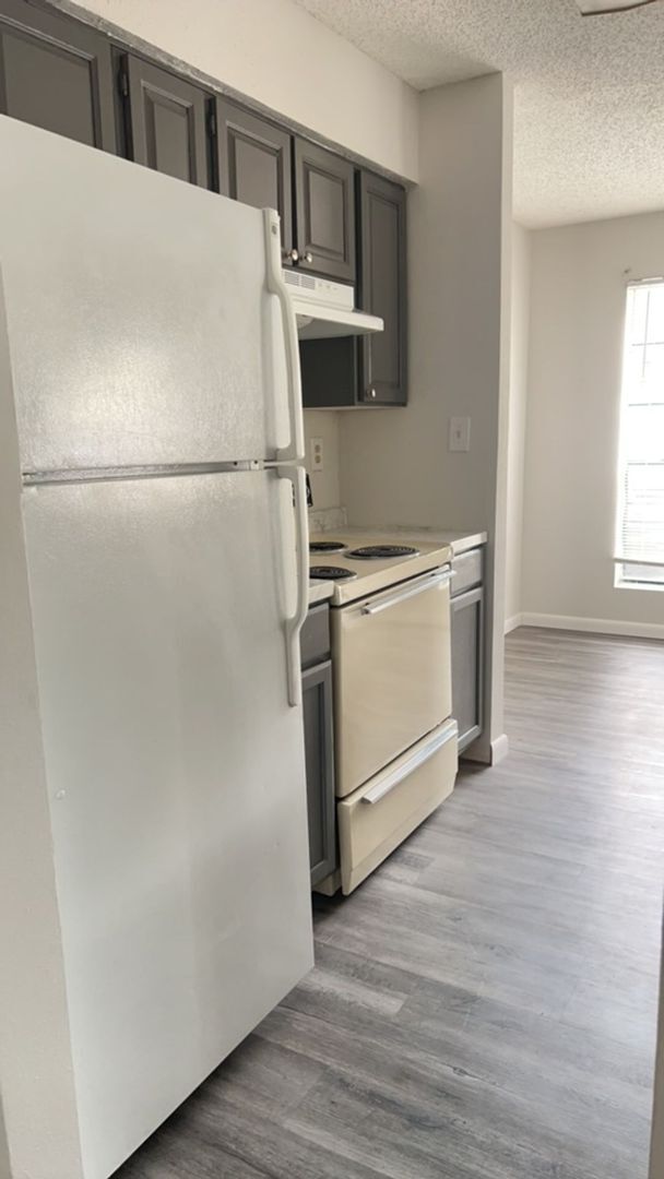 Building Photo - For Rent: 1 Bedroom, 1 Bath in a gated com...