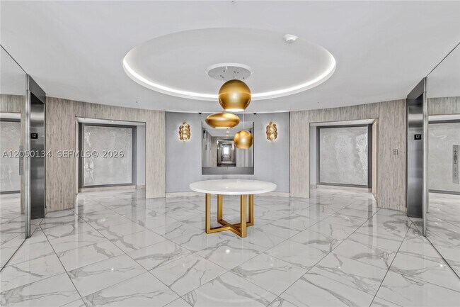Building Photo - 10275 Collins Ave
