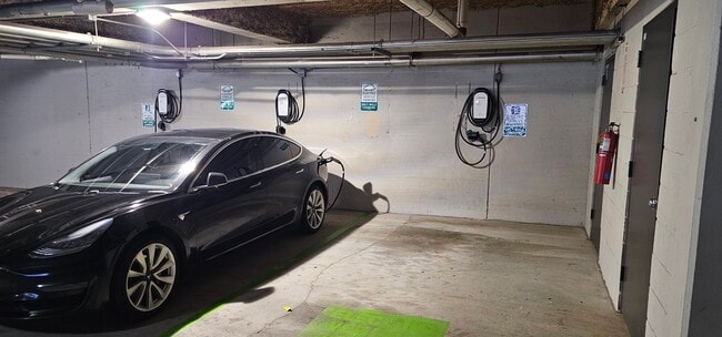 EV Charging Units in parking garage - 1075 Peachtree Walk NE