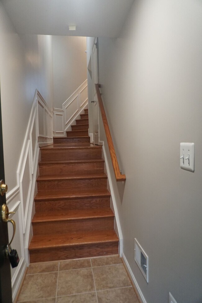 Stairs to Main Level - 23460 Twin Falls Ter
