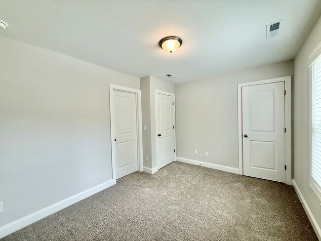 Building Photo - Stunning End Unit New Construction 3BD, 3....