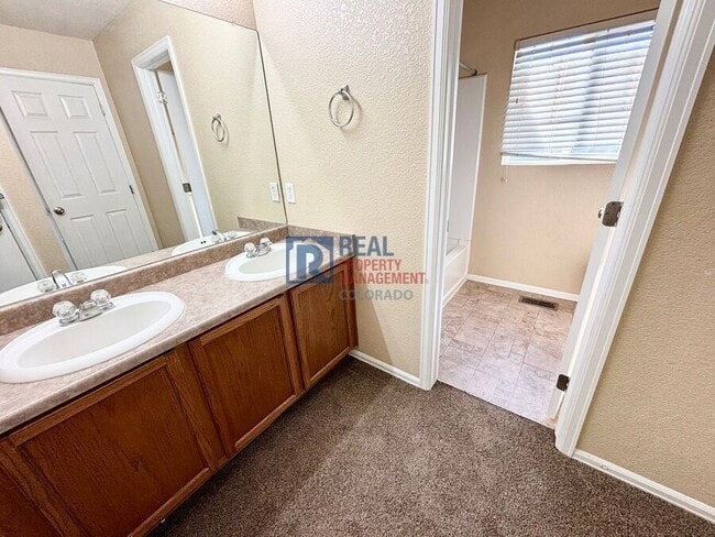 Building Photo - 9758 Laredo St.