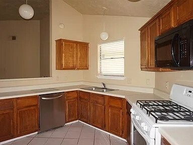 Building Photo - 6023 Woodmancote Dr