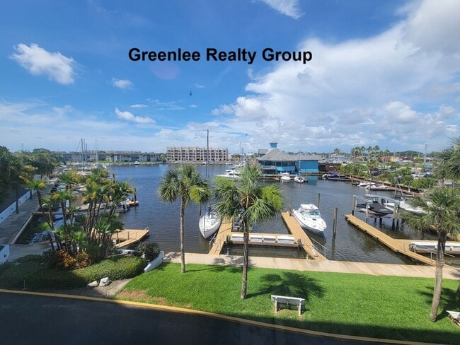 Building Photo - Waterfront Living & Maintenance Free Living at Its Finest – With Views You’ll Never Get Tired Of!