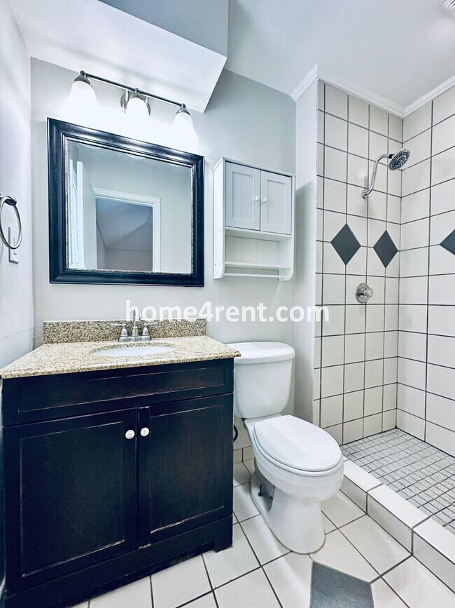 Building Photo - A Lovely Four Bedroom Home in Lenexa w/ Wood Floors, Finished Basement and a Fenced Yard!