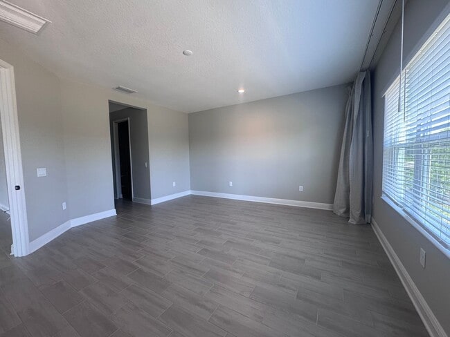 Building Photo - New Construction in Grand Park-4 Bedrooms and 4 Bathrooms with a Den and a Loft! No deposit for q...