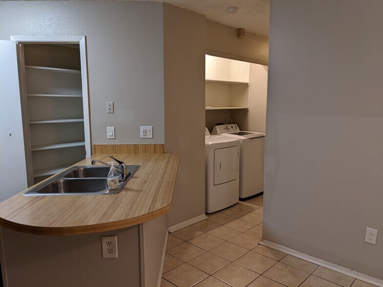 Walk-In Pantry & Laundry Area - 2524 Corian Glen Dr