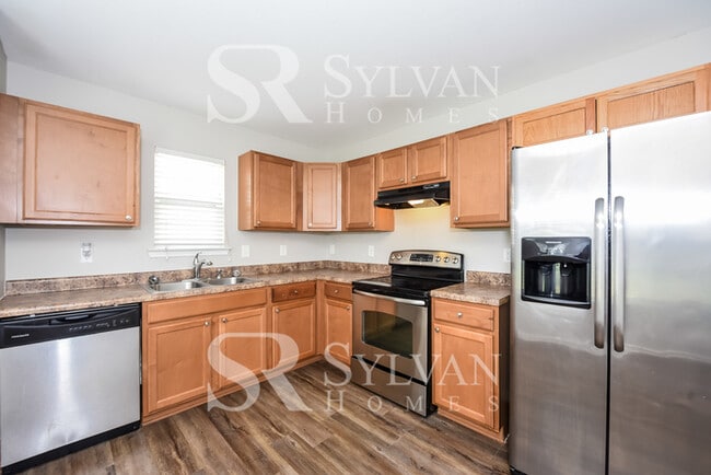 Building Photo - Spacious 4BR 2.5BA Home