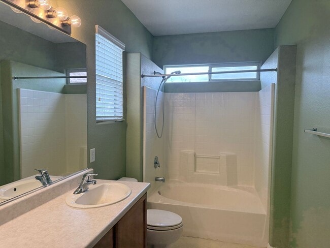 Building Photo - 2-story single-family home located in a ga...