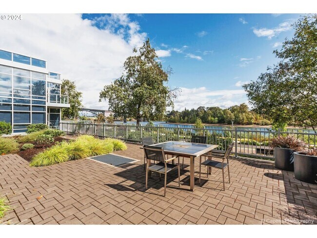 Building Photo - Spacious, open-concept 1-bedroom 7th floor condo in the South Waterfront District.