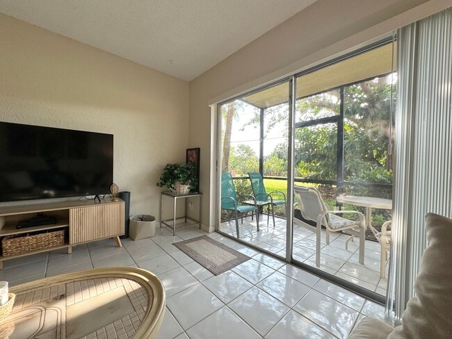 Building Photo - 5-Min Walk to FAU – Private Room in Furnished 2/2 Condo w/ Pool & Canal Views – $1550