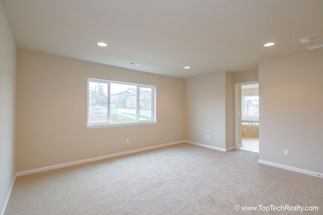 Building Photo - Spacious 4-Bedroom + Office Home in Abbey Creek – Modern Finishes, EV Charger & Low-Maintenance B...