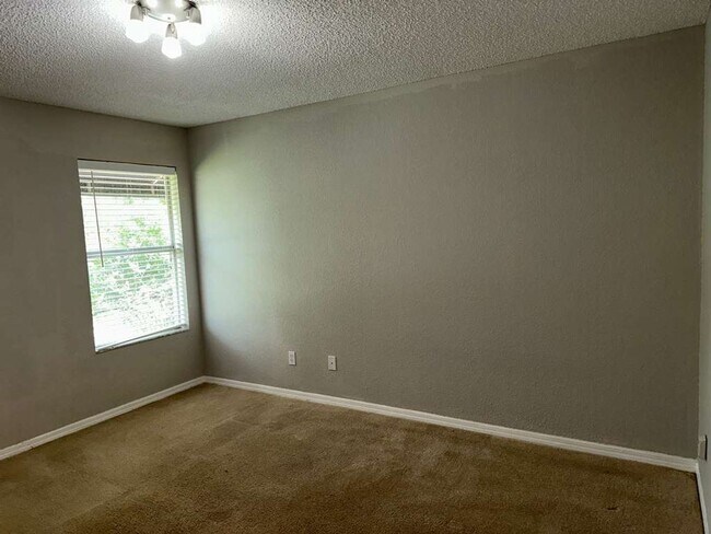 Building Photo - Cozy 2/2 2nd Floor Condo by Millenia Mall!...