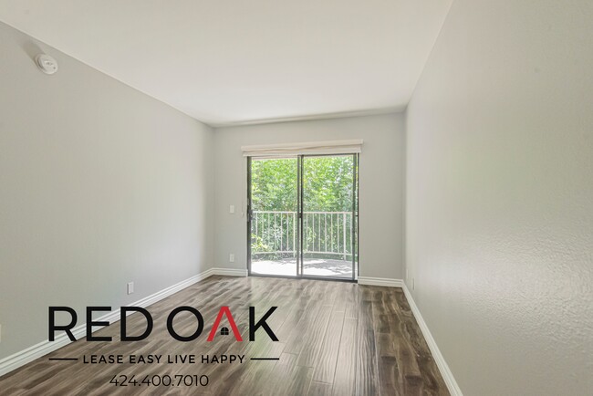 Building Photo - ~1 Month FREE~ Stunning One Bedroom with T...