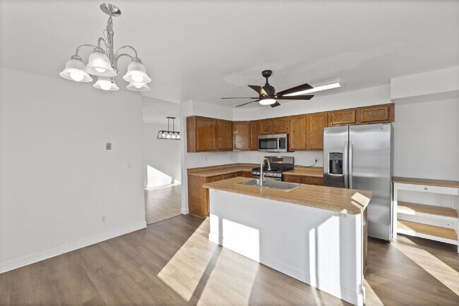 Building Photo - Spacious 6-Bedroom / 3.5-Bath Home — Great Location + Solar Savings!