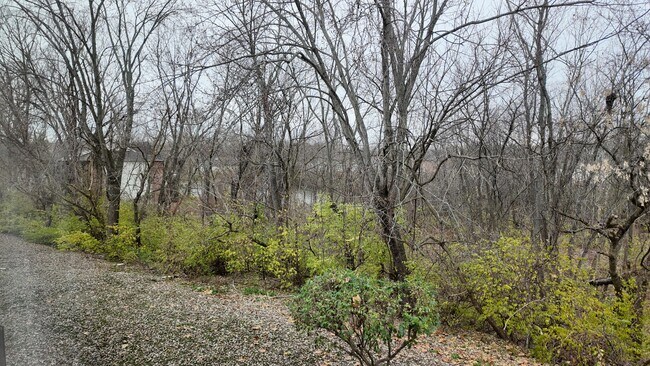 Building Photo - Spacious 2-Bed Townhome with Finished Basement, Pond View & Attached Garage in Fairfield