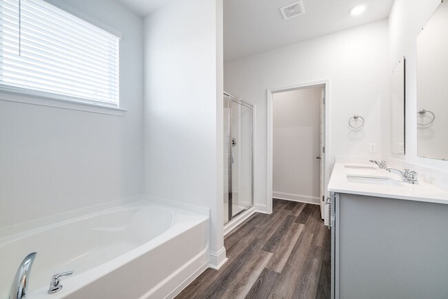 Building Photo - Beautiful 4BR Home in Woodland Trail – Top...