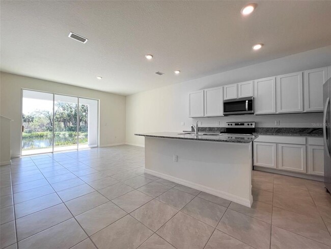 Building Photo - 8756 Milestone Dr