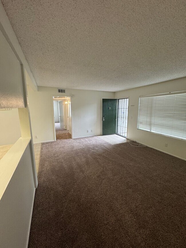Building Photo - Resort-Style Condo Living with Pool Access & Community Amenities
