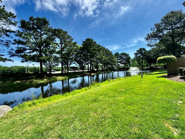 Building Photo - Available 06-15-25! End-Unit Condo w/2 Pri...