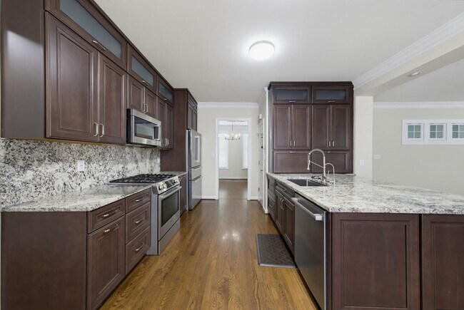 Building Photo - Southern Charm Meets Everyday Entertainment and Convenience!