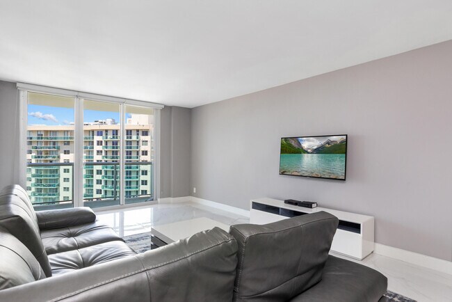 Building Photo - 19380 Collins Ave