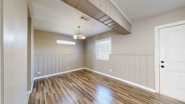 Building Photo - 3 bed 2 bath home with a carport in backyard