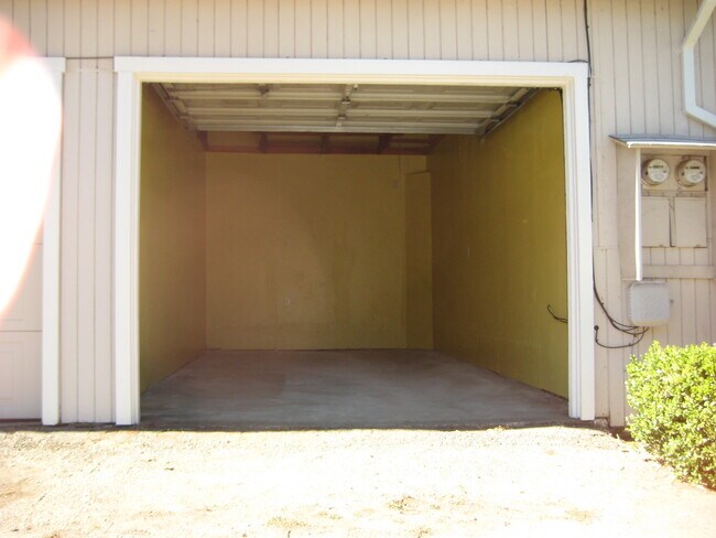 Garage with roll up door. - 567 San Geronimo Valley Dr
