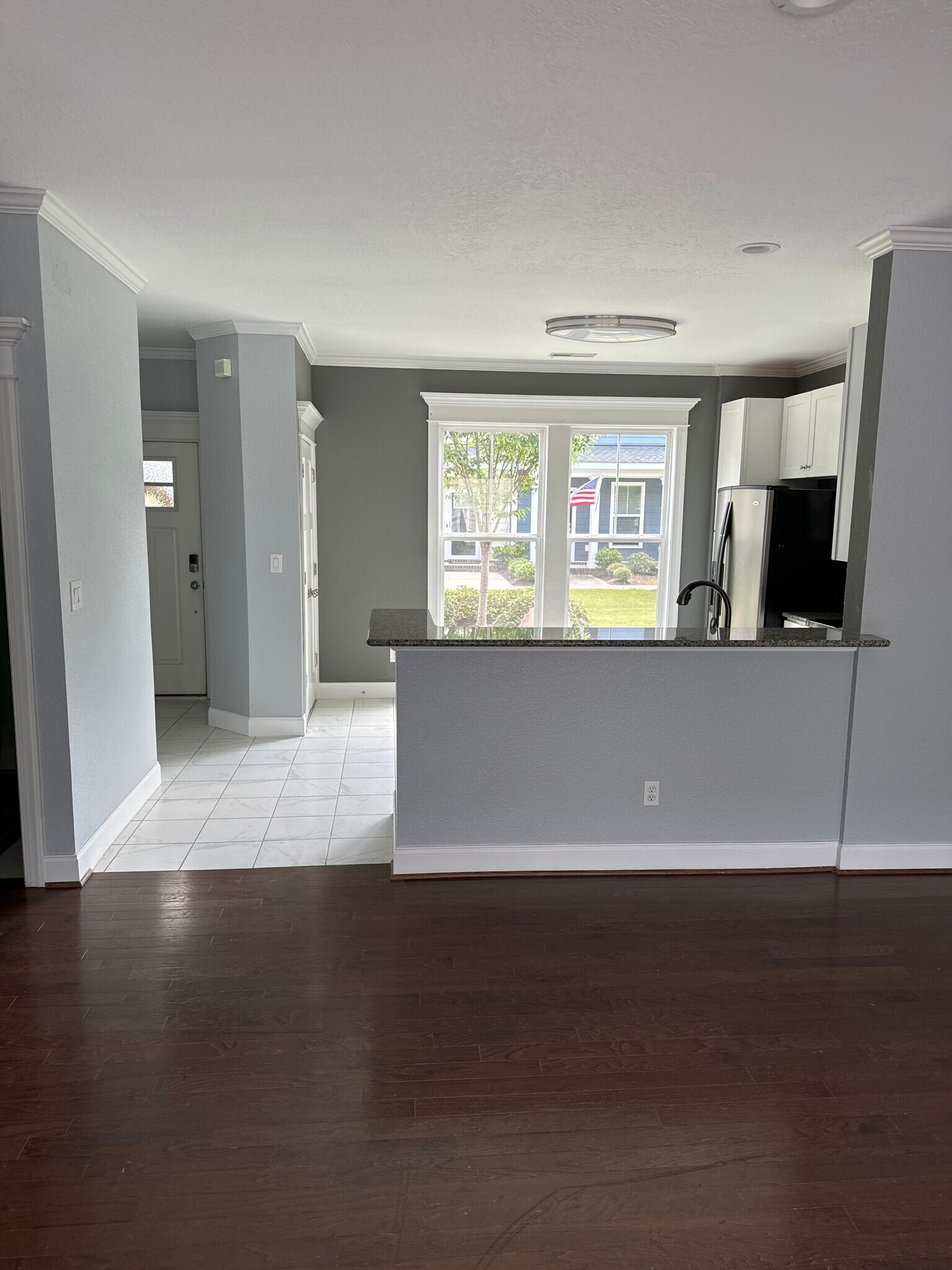 View from living room in to kitchen. - 611 Veery St