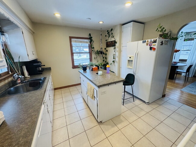 Building Photo - Spacious 5-Bed Home with Finished Basement & Gleaming Hardwood Floors in St. Louis Park!