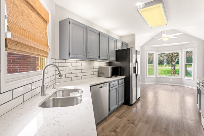 Building Photo - Fully Updated - Beautiful 3BR/2BA single-level home with a finished walk-out basement!