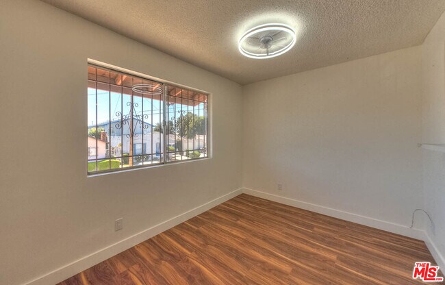 Building Photo - 8468 S Halldale Ave
