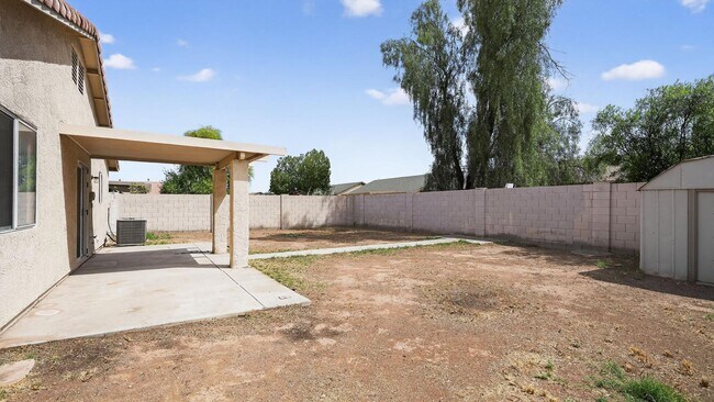 Building Photo - 7395 W San Miguel Ave